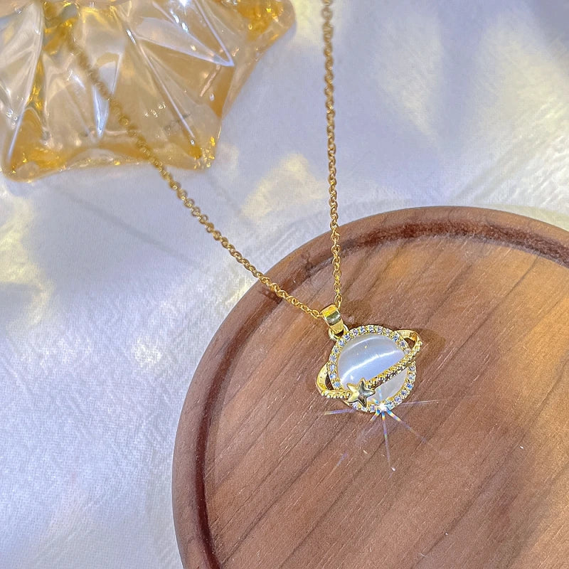Shining Planet necklace; Luxurious white quartz jewelry; Elegant quartz necklace; White quartz gemstone necklace; Dazzling white quartz pendant; Statement jewelry piece; Artisan-crafted necklace; Nature-inspired luxury; Crystal quartz necklace; Unique gemstone pendant; Shining quartz design; White quartz for elegance; 