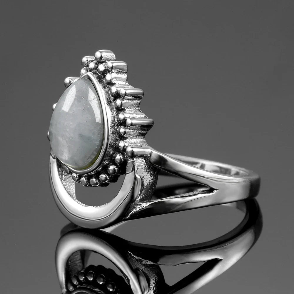 Illuminated Moon ring; Celestial moonstone jewelry; Energetic moonstone ring; Moonstone statement ring; Ethereal moonstone design; Unique celestial jewelry; Healing moonstone ring; Artisan-crafted moonstone piece; Adjustable moonstone ring; Elegant lunar-inspired jewelry; Bohemian moonstone accessory; Natural stone ring; Dazzling moonstone elegance; Celestial-themed ring; Mystical moonstone collection; Handmade moonstone jewelry;