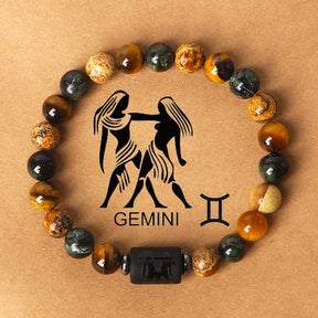 Zodiac sign bracelets; Tiger's Eye bracelet; Handcrafted gemstone jewelry; Unique design for astrological connection; Artisan-crafted accessory; Ethically sourced materials; Gift for astrology enthusiasts; Stylish and meaningful for everyday wear; Durable and fashionable; Beautifully polished Tiger's Eye stones for grounding energy; Unique spiritual gift for zodiac lovers; Bracelet for enhancing intuition and protection; Natural stones for emotional balance and confidence;