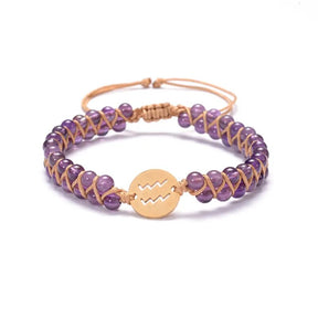 Zodiac bracelet; Braided design; Handcrafted zodiac jewelry; Unique astrological accessory; Artisan-crafted bracelet; Ethically sourced materials; Gift for astrology enthusiasts; Stylish and comfortable for daily wear; Beautiful braided details; Personalized zodiac sign representation; Perfect for layering with other bracelets; Unique spiritual gift; Bracelet for intention setting; Durable and fashionable design; Ideal for any occasion; Symbol of celestial connection; 