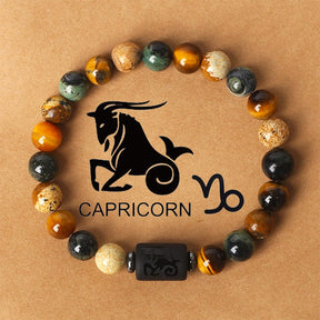 Zodiac sign bracelets; Tiger's Eye bracelet; Handcrafted gemstone jewelry; Unique design for astrological connection; Artisan-crafted accessory; Ethically sourced materials; Gift for astrology enthusiasts; Stylish and meaningful for everyday wear; Durable and fashionable; Beautifully polished Tiger's Eye stones for grounding energy; Unique spiritual gift for zodiac lovers; Bracelet for enhancing intuition and protection; Natural stones for emotional balance and confidence;