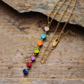 Chakra energy necklace; Aligns and balances chakras; Natural stones for holistic healing; Promotes emotional well-being and balance; Beautifully designed for everyday wear; Enhances spiritual growth and awareness; Ideal gift for wellness enthusiasts; Handcrafted with natural materials; Supports meditation and mindfulness practices; Vibrant colors representing each chakra; Lightweight and comfortable design; Durable and long-lasting energy jewelry;