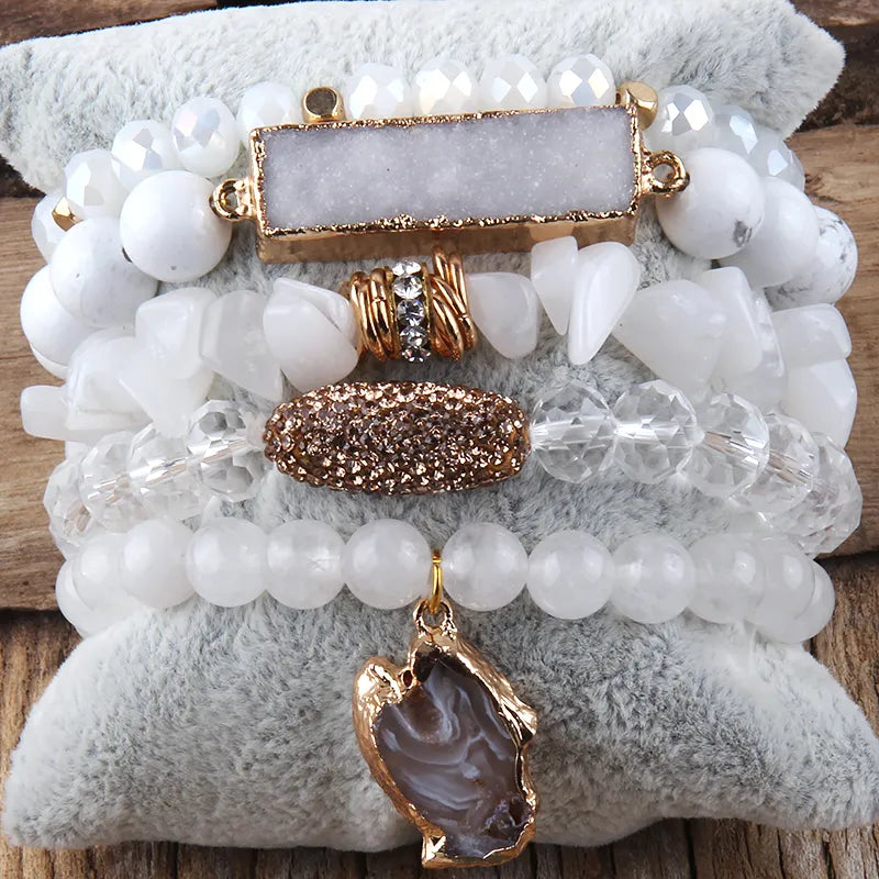 Natural Elegance set; Set of 5 bracelets; Handcrafted jewelry collection; Natural stones and glass crystals; Unique and stylish design; Artisan-crafted bracelets; Ethically sourced materials; Versatile accessories for layering; Healing energy bracelets; Beautifully designed for any occasion; Gift for jewelry lovers; Perfect for everyday wear; Statement pieces for a chic look; Durable and fashionable; Combination of natural beauty and elegance;