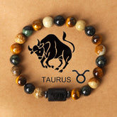 Zodiac sign bracelets; Tiger's Eye bracelet; Handcrafted gemstone jewelry; Unique design for astrological connection; Artisan-crafted accessory; Ethically sourced materials; Gift for astrology enthusiasts; Stylish and meaningful for everyday wear; Durable and fashionable; Beautifully polished Tiger's Eye stones for grounding energy; Unique spiritual gift for zodiac lovers; Bracelet for enhancing intuition and protection; Natural stones for emotional balance and confidence;
