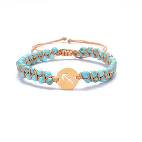 Zodiac bracelet; Braided design; Handcrafted zodiac jewelry; Unique astrological accessory; Artisan-crafted bracelet; Ethically sourced materials; Gift for astrology enthusiasts; Stylish and comfortable for daily wear; Beautiful braided details; Personalized zodiac sign representation; Perfect for layering with other bracelets; Unique spiritual gift; Bracelet for intention setting; Durable and fashionable design; Ideal for any occasion; Symbol of celestial connection; 