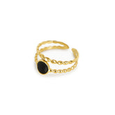 adjustable onyx ring; 18k gold-plated jewelry; stylish onyx ring; elegant adjustable ring; unique gold and onyx design; versatile ring for any occasion; high-quality craftsmanship; trendy gemstone ring; perfect gift for her; luxurious onyx accessory; chic gold ring; fashionable adjustable jewelry; statement ring with onyx; beautiful gold-plated ring; handcrafted onyx ring; elegant and modern design; timeless 18k gold piece; stunning black onyx ring; lightweight and comfortable wear; distinctive onyx stone; 