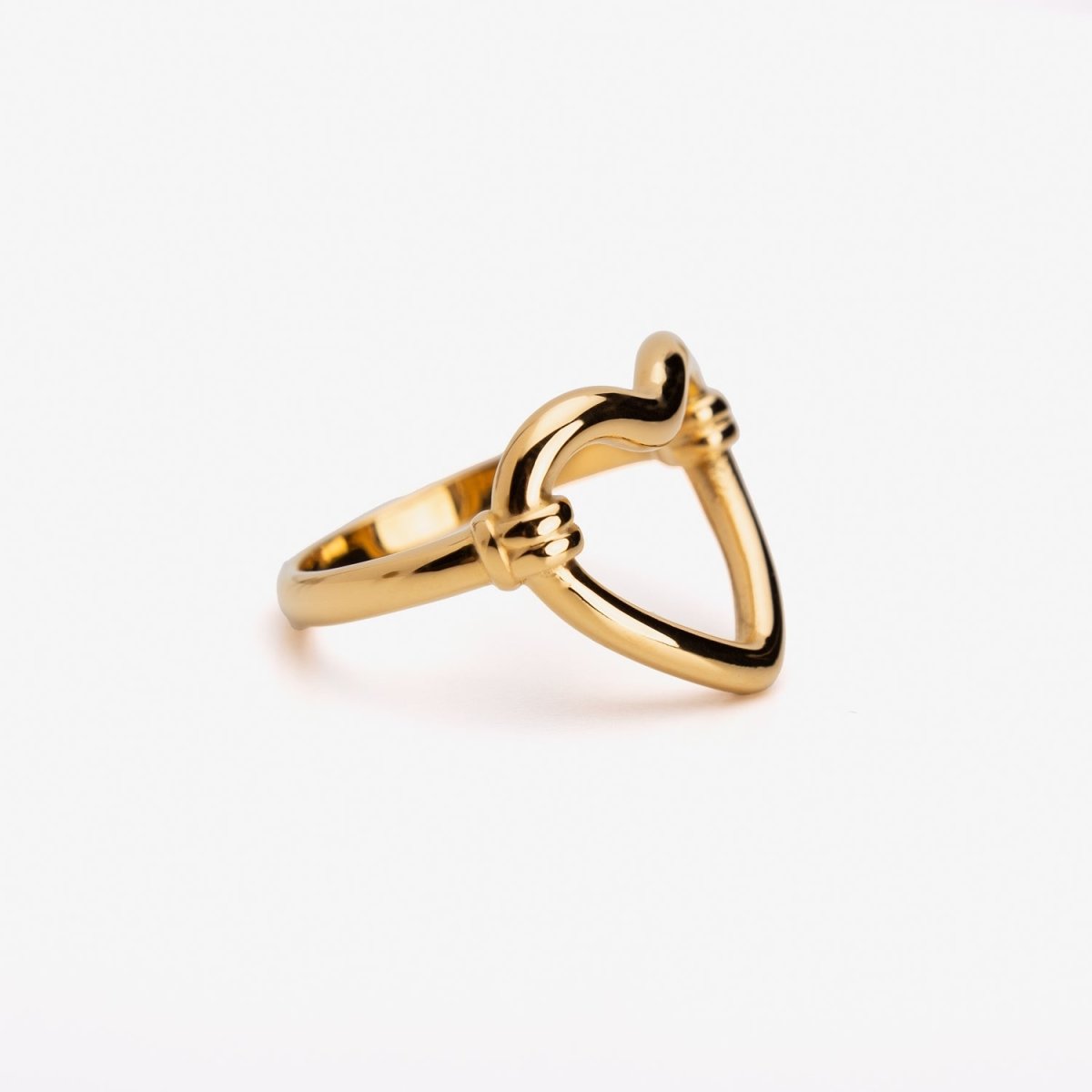 hollow heart ring; 18k gold-plated jewelry; heart-shaped design; romantic gold ring; elegant heart ring; stylish gold accessory; perfect gift for loved ones; trendy heart-shaped jewelry; high-quality gold plating; unique fashion statement; contemporary gold ring; lightweight and delicate; luxurious gold accessory; symbol of love and affection; chic and modern heart ring; timeless elegance in gold; handmade heart ring; sophisticated jewelry piece; minimalist heart jewelry; delicate and stylish ring; 