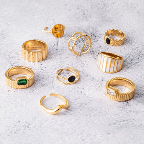 aspen ring; 18k gold-plated jewelry; elegant and modern design; stylish gold ring; luxury fashion accessory; high-quality craftsmanship; unique and eye-catching; perfect gift for her; sophisticated gold finish; versatile for any occasion; comfortable wear; contemporary elegance; durable gold plating; timeless style; statement ring; exquisite fashion piece; delicate and refined; fashionable and chic; trendy jewelry piece; unique design details;