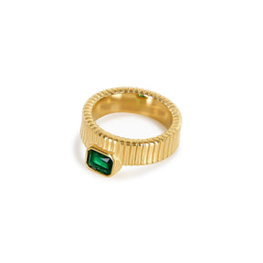 capri emerald ring; 18k gold plated jewelry; vibrant emerald stone; luxurious design; stunning green hues; elegant statement piece; unique gift for her; chic and modern; handcrafted quality; perfect for any occasion; eye-catching gemstone; adjustable fit; sophisticated accessory; radiant shine; timeless elegance; stylish and trendy; bold fashion statement; versatile ring; beautiful craftsmanship; flattering for all hands; charming and refined; perfect for stacking;