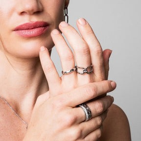 mosaic ring; silver mosaic design; intricate and artistic ring; unique mosaic pattern; elegant silver accessory; modern and stylish ring; handcrafted silver jewelry; lightweight and comfortable; perfect for casual and formal wear; timeless mosaic art style; adds a touch of sophistication; versatile and fashionable; ideal for jewelry lovers; perfect for stacking with other rings; eye-catching silver ring; high-quality silver material; durable and long-lasting finish; mosaic-inspired design;