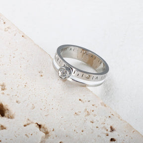 queen crystal ring; silver ring with crystal stone; timeless elegance in silver; radiant crystal stone; royal-inspired design; sophisticated crystal jewelry; perfect for special occasions; shines with every movement; luxurious silver finish; delicate and durable design; eye-catching crystal; statement silver ring; versatile and chic; elegant jewelry piece; silver ring for women; refined and polished look; ideal for evening wear; beautiful and classy; 