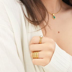 Adjustable Royale ring; elegant 18k gold plating; luxurious design for every occasion; perfect for stacking with other rings; versatile fit for all finger sizes; timeless piece for modern jewelry lovers; ideal for both casual and formal wear; a statement of sophistication; handcrafted with attention to detail; a thoughtful gift for special moments; complements any jewelry collection; combines classic style with contemporary flair; adjustable comfort for daily wear; enhances your personal style; 