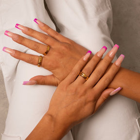 Trinity ring; 18K gold-plated Trinity ring; Gold-plated Trinity design; 18K gold ring; Trinity gold ring; Gold-plated fashion ring; Elegant Trinity ring; 18K gold-plated jewelry; Classic Trinity ring; Stylish gold-plated ring; Minimalist Trinity ring; Timeless Trinity design; Gold fashion jewelry; 18K gold statement ring; Triple band Trinity ring; Sophisticated gold ring;