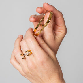 Truth ring; 18k gold plated ring; elegant and timeless; luxury gold jewelry; statement ring; classic gold design; perfect gift for her; gold-plated beauty; minimalist gold ring; high-quality craftsmanship; trendy and fashionable; sophisticated accessory; bold and stylish; versatile for all occasions; durable gold finish; handcrafted ring; modern elegance; chic and refined; lightweight and comfortable; luxurious shine; perfect everyday ring;