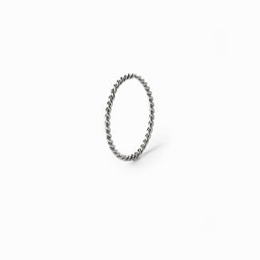 Silver twist ring; elegant twisted design; modern silver jewelry; stylish statement piece; unique spiral ring; perfect for stacking; versatile accessory for any occasion; sophisticated and chic; lightweight and comfortable; ideal gift for her; enhances everyday outfits; contemporary silver finish; unique craftsmanship; durable and long-lasting; adds a touch of elegance; great for casual or formal wear; perfect for layering with other rings;