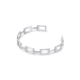 Silver bracelet; elegant accessory; discreet luxury; sophisticated fashion; refined style; silver shine; delicate jewellery; luxurious detail; elegant design; impeccable finish; perfect gift; timeless fashion; versatile accessory; classic beauty; subtle glamour; feminine style; high quality; exclusive piece; silver charm; touch of elegance.