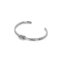 Silver bracelet; elegant accessory; discreet luxury; sophisticated fashion; refined style; silver shine; delicate jewellery; luxurious detail; elegant design; impeccable finish; perfect gift; timeless fashion; versatile accessory; classic beauty; subtle glamour; feminine style; high quality; exclusive piece; silver charm; touch of elegance.