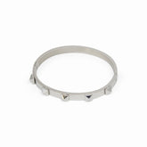 Silver bracelet; elegant accessory; discreet luxury; sophisticated fashion; refined style; silver shine; delicate jewellery; luxurious detail; elegant design; impeccable finish; perfect gift; timeless fashion; versatile accessory; classic beauty; subtle glamour; feminine style; high quality; exclusive piece; silver charm; touch of elegance.