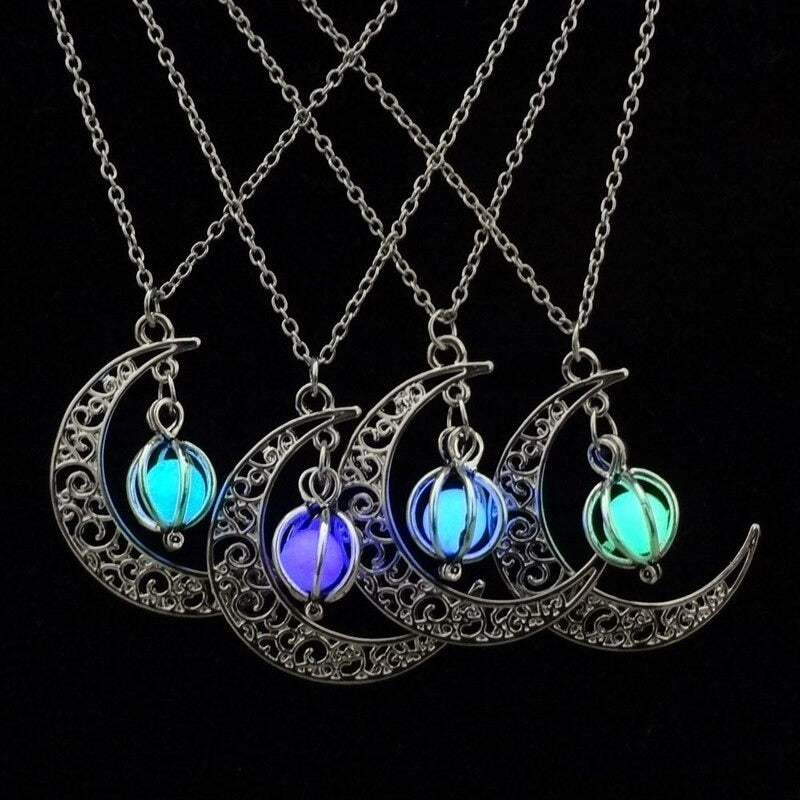 Luminous moon pendant necklace; Glows in the dark jewelry; Moon-inspired glowing necklace; Unique celestial necklace design; Captures the magic of the night sky; Perfect gift for moon lovers; Ethereal glow in the dark pendant; Handcrafted luminous jewelry; Stylish accessory for day or night; Symbol of mystery and elegance; Adds a touch of celestial beauty;