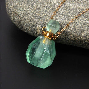 Natural crystal diffuser necklace; Handcrafted aromatherapy jewelry; Unique design for essential oil diffusion; Artisan-crafted accessory; Ethically sourced crystals; Stylish and functional for everyday wear; Durable and fashionable; Beautifully detailed crystal pendant; Necklace for enhancing positive energy and well-being; Natural stones for emotional balance; Ideal for aromatherapy on-the-go; Lightweight and comfortable; Perfect gift for wellness enthusiasts;