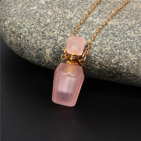 Natural crystal diffuser necklace; Handcrafted aromatherapy jewelry; Unique design for essential oil diffusion; Artisan-crafted accessory; Ethically sourced crystals; Stylish and functional for everyday wear; Durable and fashionable; Beautifully detailed crystal pendant; Necklace for enhancing positive energy and well-being; Natural stones for emotional balance; Ideal for aromatherapy on-the-go; Lightweight and comfortable; Perfect gift for wellness enthusiasts;