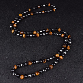 Triple protection necklace; Symbol of protection, power, and balance; Handcrafted artisan jewelry; Unique design for spiritual strength; Ethically sourced materials for conscious living; Perfect gift for those seeking inner strength; Enhances personal energy and resilience; Durable and stylish for everyday wear; Lightweight and comfortable for all-day use; Ideal for layering with other necklaces; Represents harmony and well-being; Thoughtful gift for special occasions;
