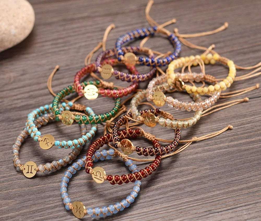 Zodiac bracelet; Braided design; Handcrafted zodiac jewelry; Unique astrological accessory; Artisan-crafted bracelet; Ethically sourced materials; Gift for astrology enthusiasts; Stylish and comfortable for daily wear; Beautiful braided details; Personalized zodiac sign representation; Perfect for layering with other bracelets; Unique spiritual gift; Bracelet for intention setting; Durable and fashionable design; Ideal for any occasion; Symbol of celestial connection; 