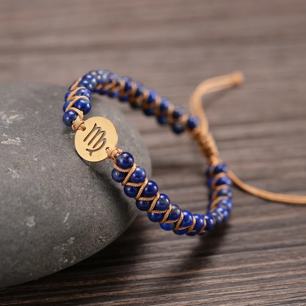 Zodiac bracelet; Braided design; Handcrafted zodiac jewelry; Unique astrological accessory; Artisan-crafted bracelet; Ethically sourced materials; Gift for astrology enthusiasts; Stylish and comfortable for daily wear; Beautiful braided details; Personalized zodiac sign representation; Perfect for layering with other bracelets; Unique spiritual gift; Bracelet for intention setting; Durable and fashionable design; Ideal for any occasion; Symbol of celestial connection; 