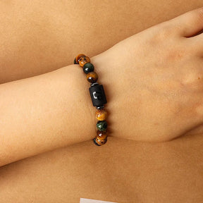 Zodiac sign bracelets; Tiger's Eye bracelet; Handcrafted gemstone jewelry; Unique design for astrological connection; Artisan-crafted accessory; Ethically sourced materials; Gift for astrology enthusiasts; Stylish and meaningful for everyday wear; Durable and fashionable; Beautifully polished Tiger's Eye stones for grounding energy; Unique spiritual gift for zodiac lovers; Bracelet for enhancing intuition and protection; Natural stones for emotional balance and confidence;