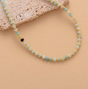 Natural stone choker necklace; Handcrafted bohemian choker jewelry; Unique design featuring authentic natural stones; Artisan-crafted accessory for a stylish look; Ethically sourced materials for eco-conscious shoppers; Versatile and trendy for everyday wear; Lightweight and comfortable for all-day use; Beautifully detailed natural stone accents; Choker for enhancing personal style and expression; Ideal for layering with other necklaces; Perfect gift for fashion lovers and nature enthusiasts;