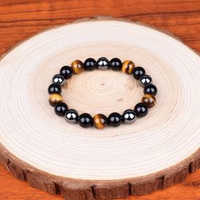 Triple protection bracelet; Protection, power, and balance bracelet; Handcrafted gemstone jewelry; Unique design for spiritual shielding; Artisan-crafted accessory; Ethically sourced materials; Gift for those seeking strength and security; Stylish and protective for everyday wear; Durable and fashionable; Beautifully polished stones for protection and grounding; Unique spiritual gift; Bracelet for enhancing personal power and stability; Natural stones for emotional balance and inner strength;