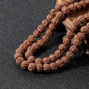 Rudraksha and Onyx japamala; Protection mala necklace; 108 beads prayer necklace; Handcrafted spiritual jewelry; Natural Rudraksha seeds; Onyx stone for protection; Artisan-crafted japamala; Japamala for mindfulness; Free bracelet included; Gift for meditation enthusiasts; Japamala for spiritual growth; Japamala for protection and grounding; Beautiful beaded necklace; Unique spiritual gift; Japamala for intention setting; Calming meditation accessory;